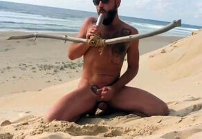dude porks himself on the beach with a